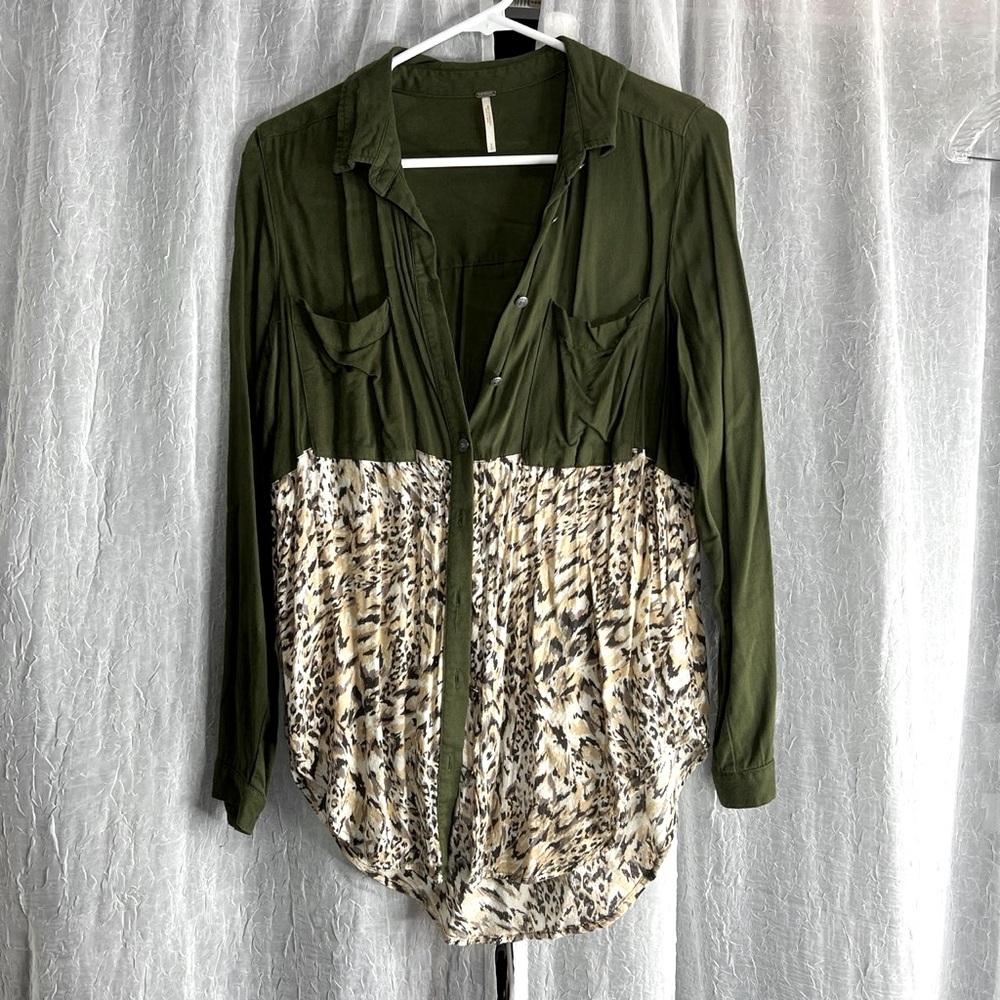 Free People oversized button up shirt. The bottom is semi sheer. Vintage 2000s!